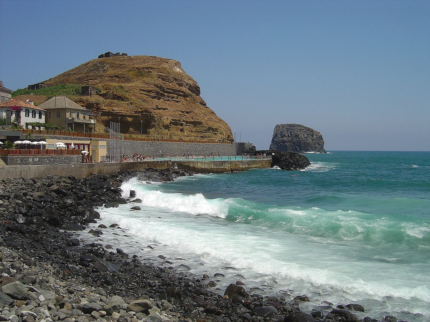 Historic view of Porto da Cruz seafront, pools and Atlantic waves, photographed in 2005.